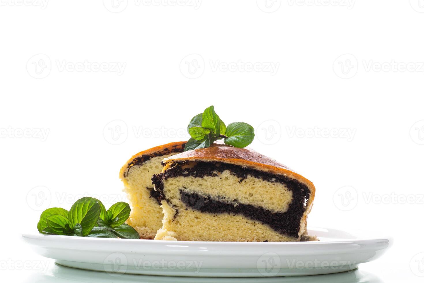 roll with poppy seeds inside on a white background photo