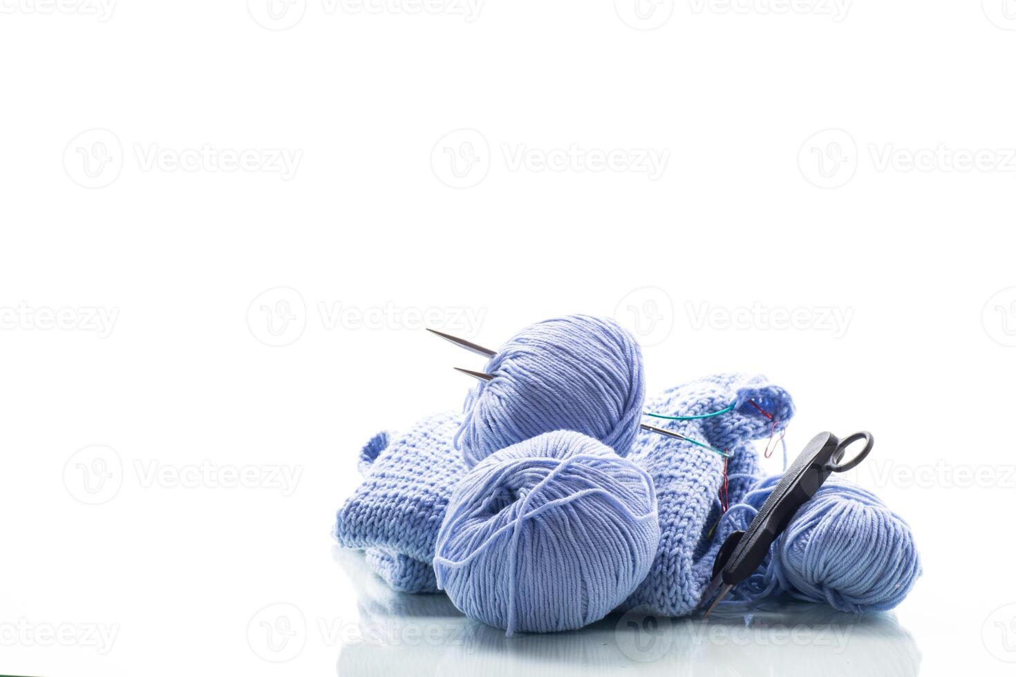 Set for hand knitting, blue yarn, knitting needles. photo