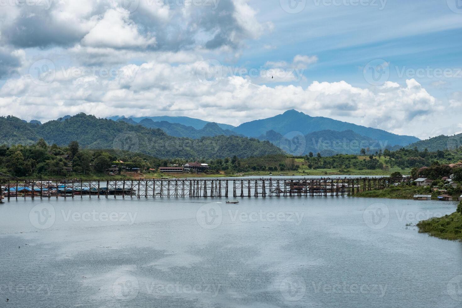 Scenic famous wooden mon bridge in sangkhlaburi photo