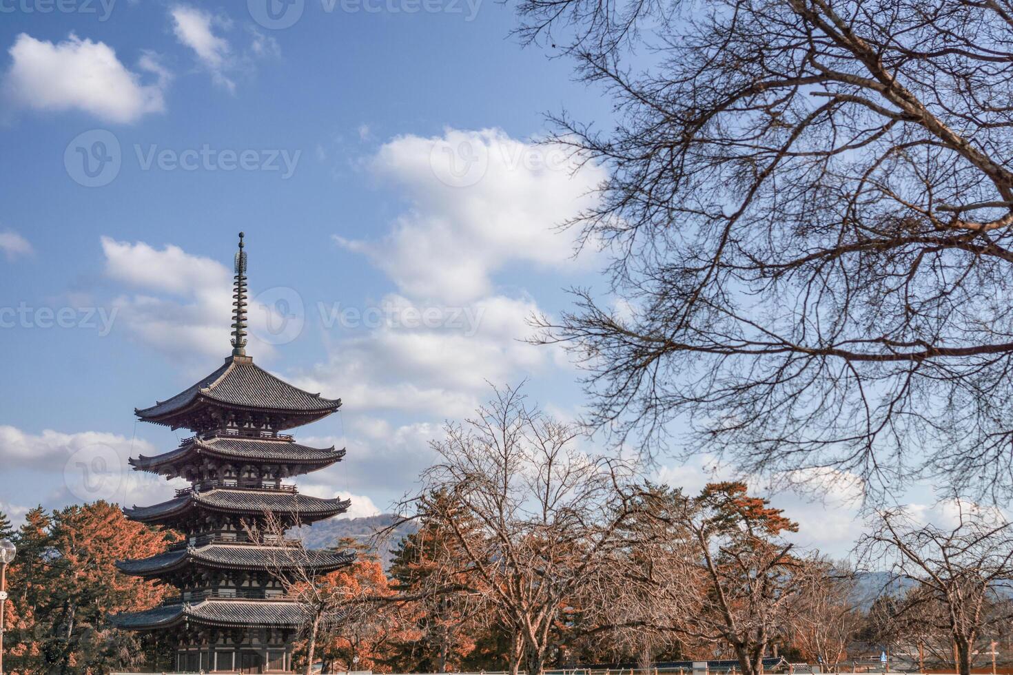 Suma-dera temple with wooden ancient pagoda in autumn park at Kobe photo