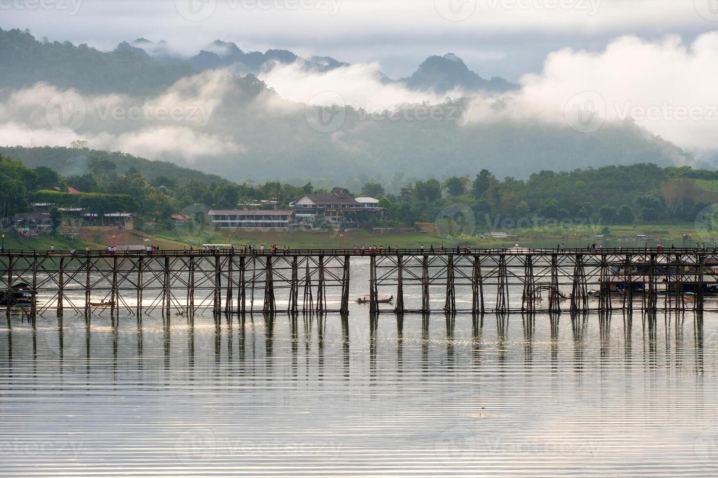 Scenic famous wooden mon bridge in sangkhlaburi photo