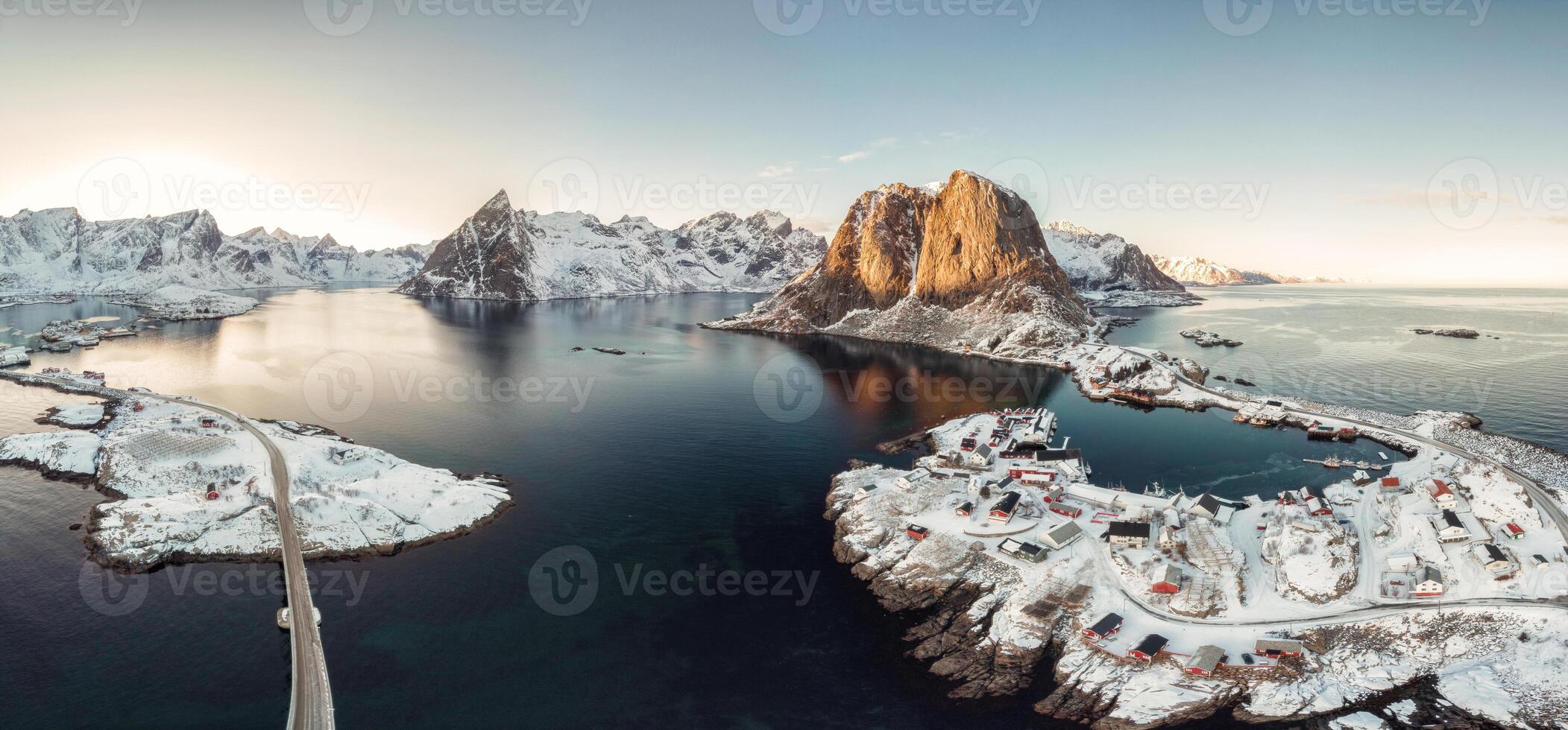 Panorama aerial view of archipelago of arctic ocean with fishing village in winter photo