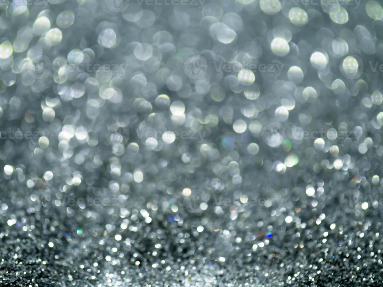 Silver sparkling glitter bokeh background. photo