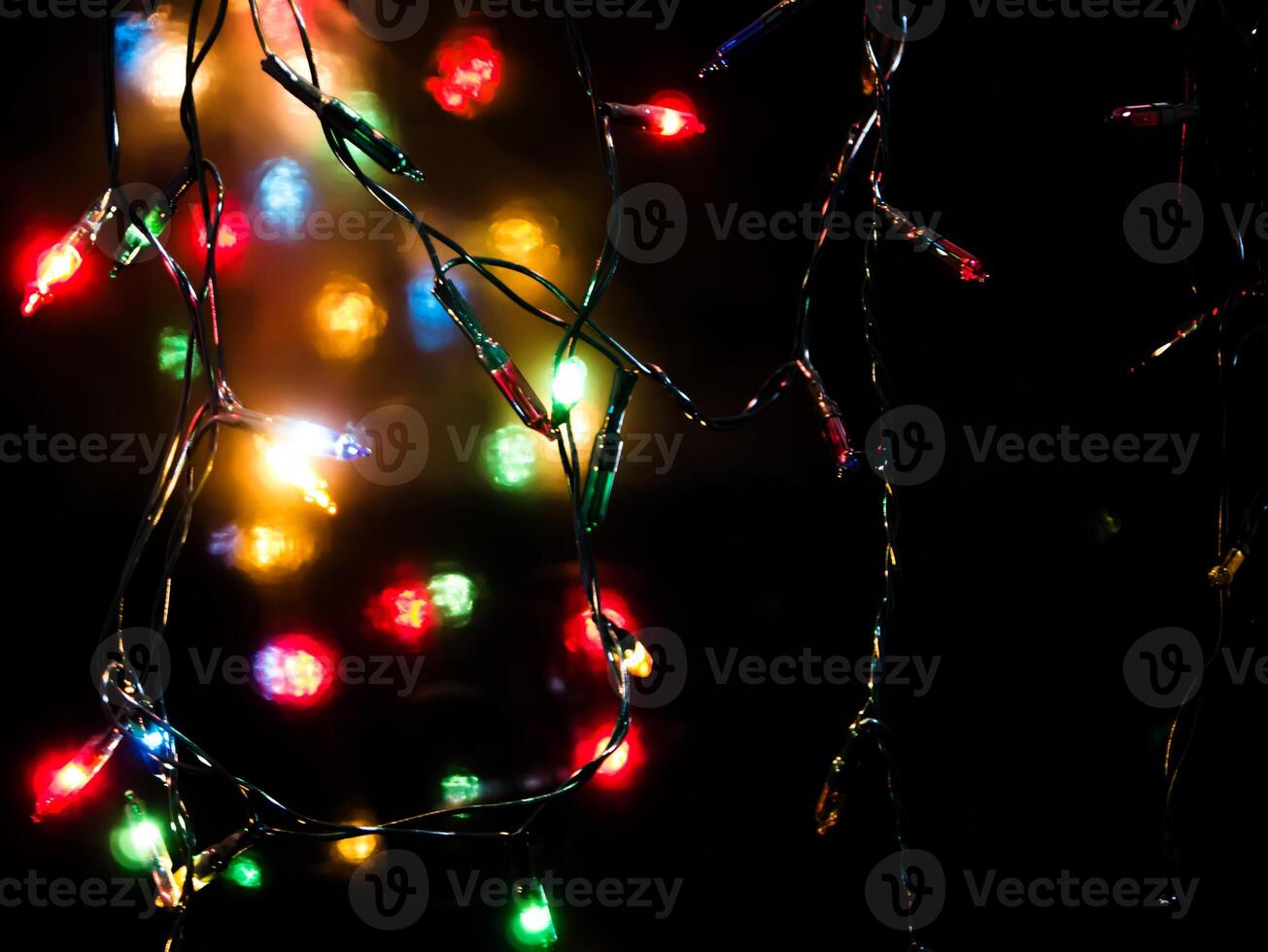 Light bokeh with a black background. photo