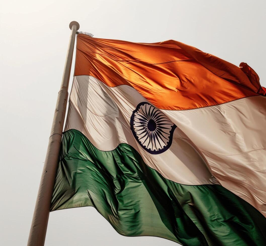 AI generated the wind flutters an indian flag in front of a white background photo