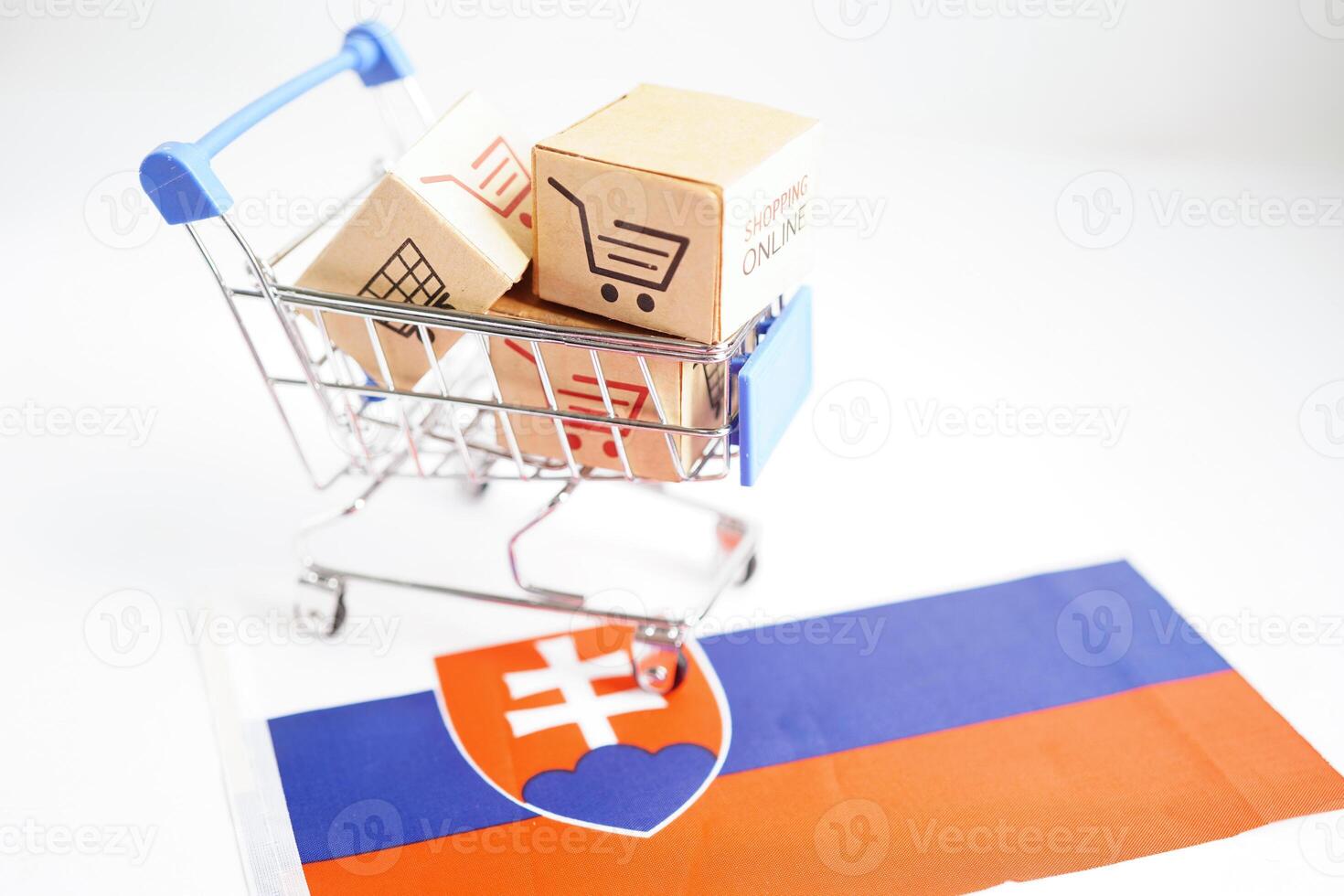Online shopping, Shopping cart box on Slovakia flag, import export, finance commerce. photo