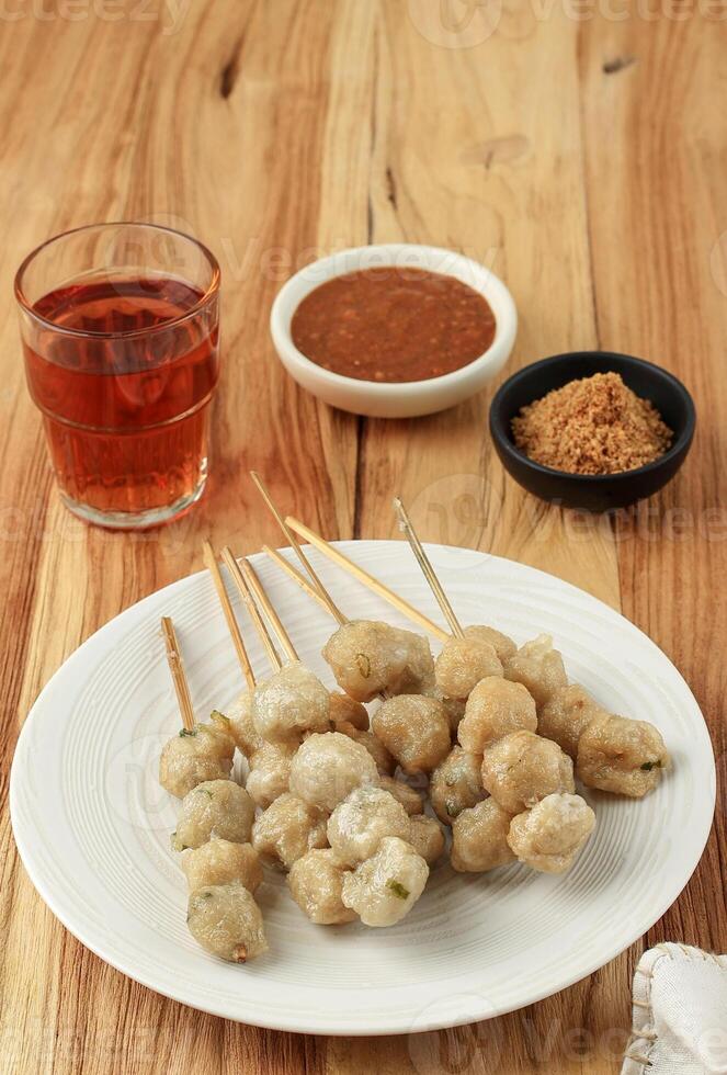 Cilok Goreng Tusuk, Deep Fried Tapioca Balls Served with Peanut Sauce and Spicy Powder photo