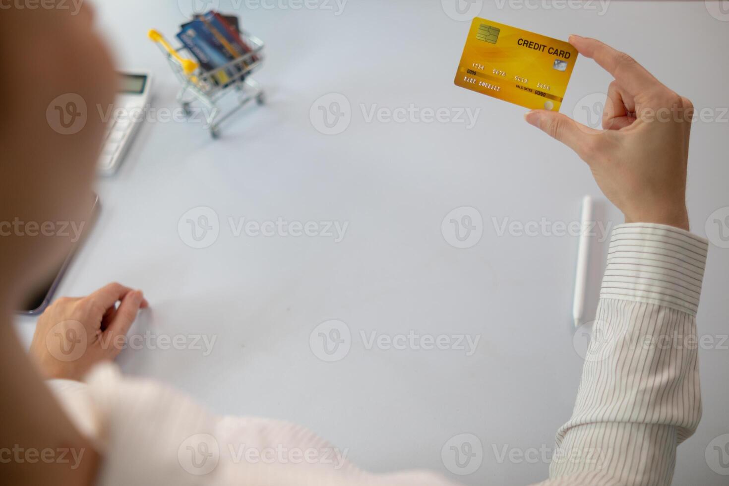 young businesswoman is distraught after exceeding her credit card limit and is being sued by the credit card company for payment plus interest and fines as per the contract due to default on debt photo