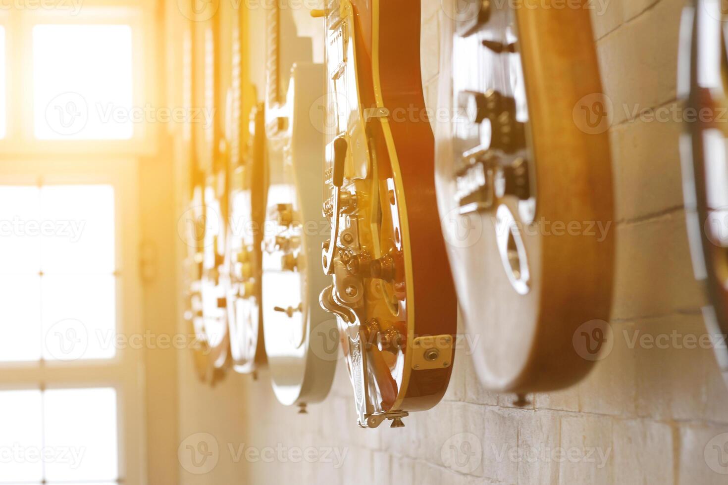 Guitars that were kept in the music practice room It is a guitar that is provided for musicians to practice and learn before performing in order to reduce the mistake of playing guitar on stage. photo