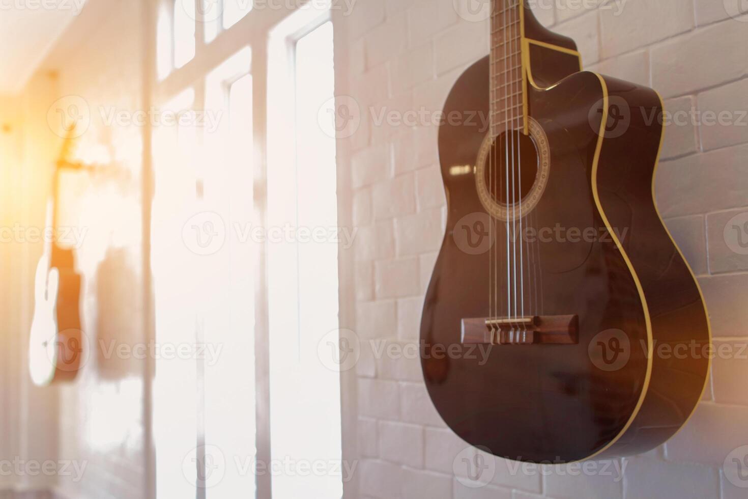 Guitars that were kept in the music practice room It is a guitar that is provided for musicians to practice and learn before performing in order to reduce the mistake of playing guitar on stage. photo