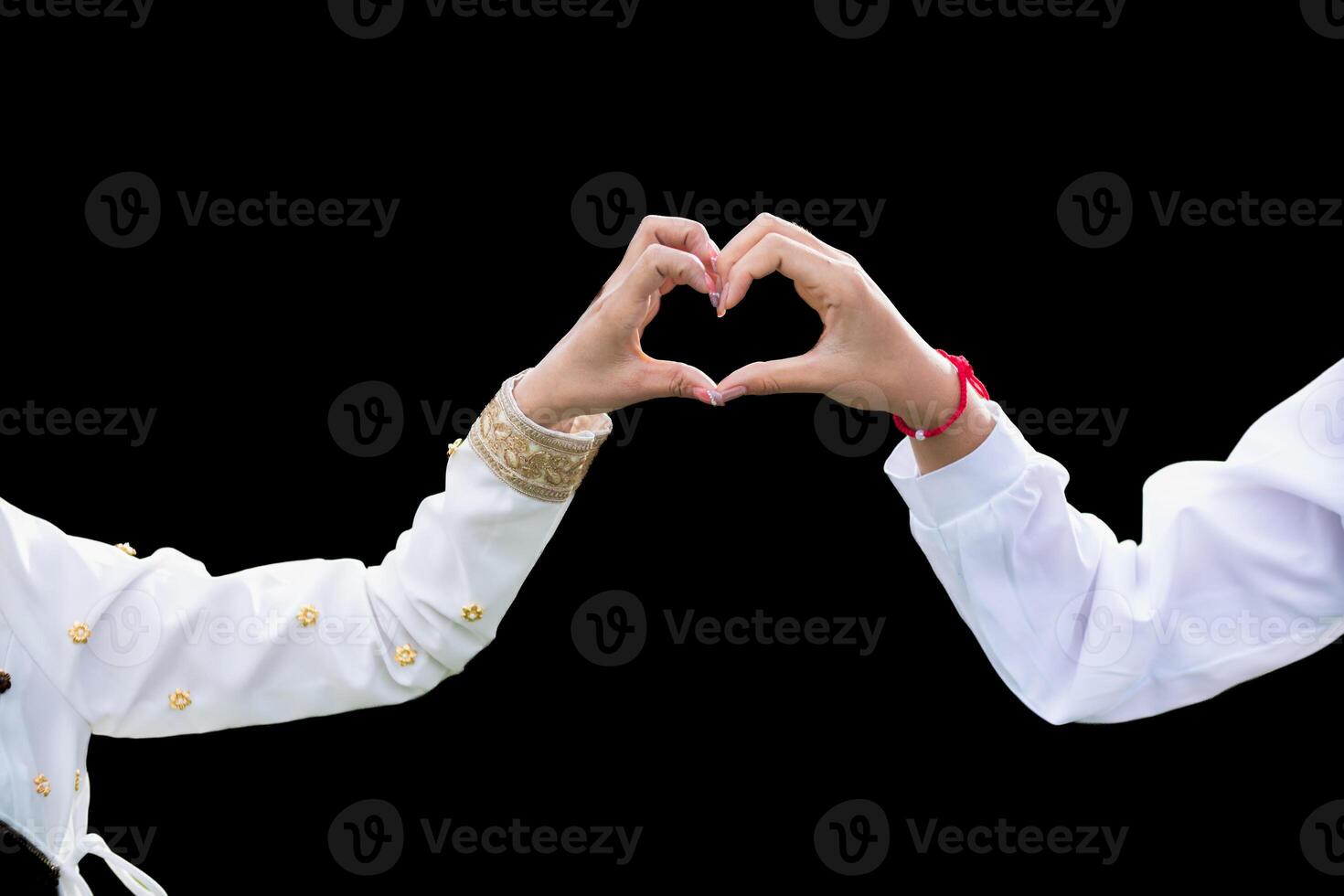 woman raised her hands and made heart symbol to express meaning of love friendship and kindness to her friends and lovers. woman uses her hands to make a heart symbol that means love and friendship. photo