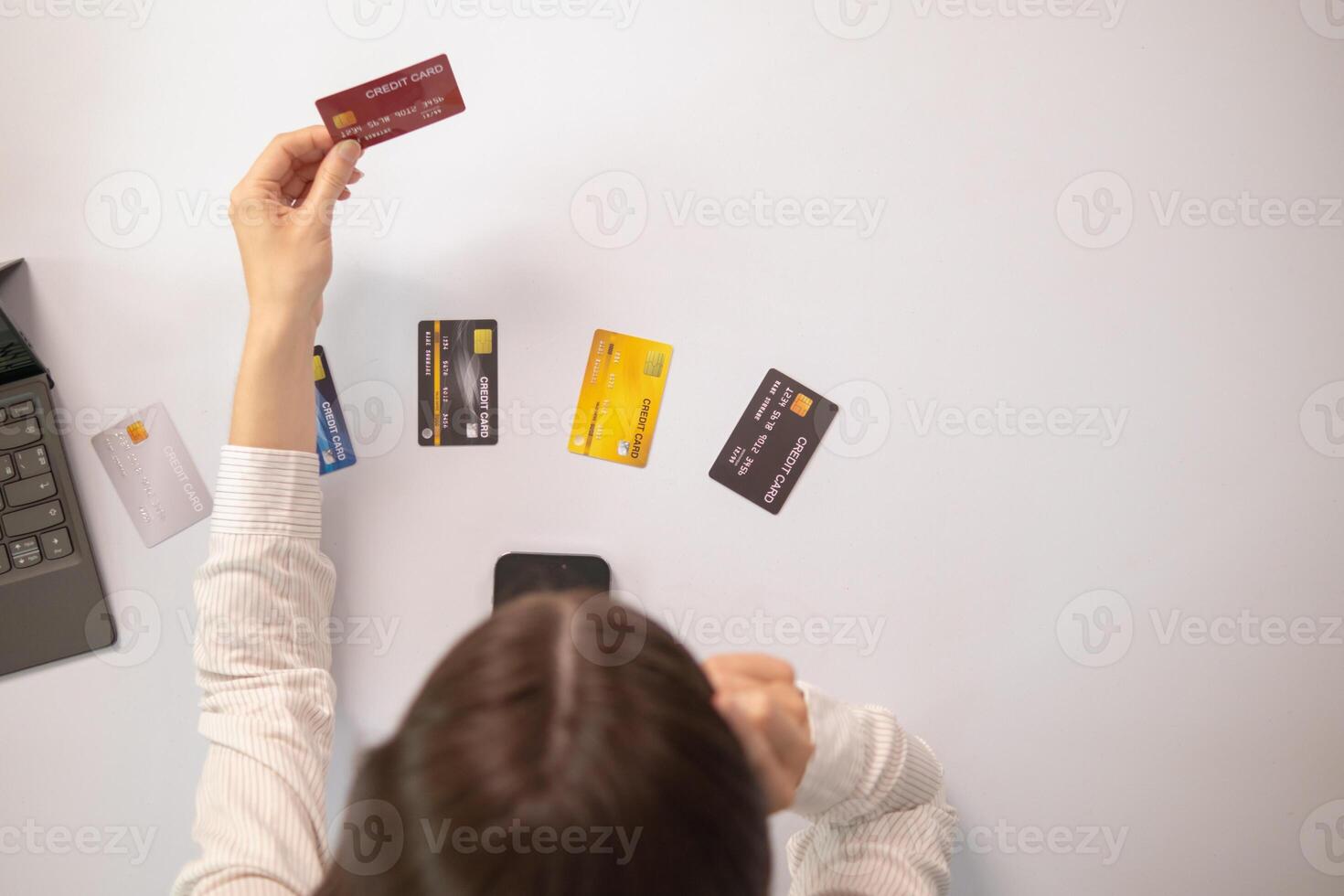 young businesswoman is distraught after exceeding her credit card limit and is being sued by the credit card company for payment plus interest and fines as per the contract due to default on debt photo