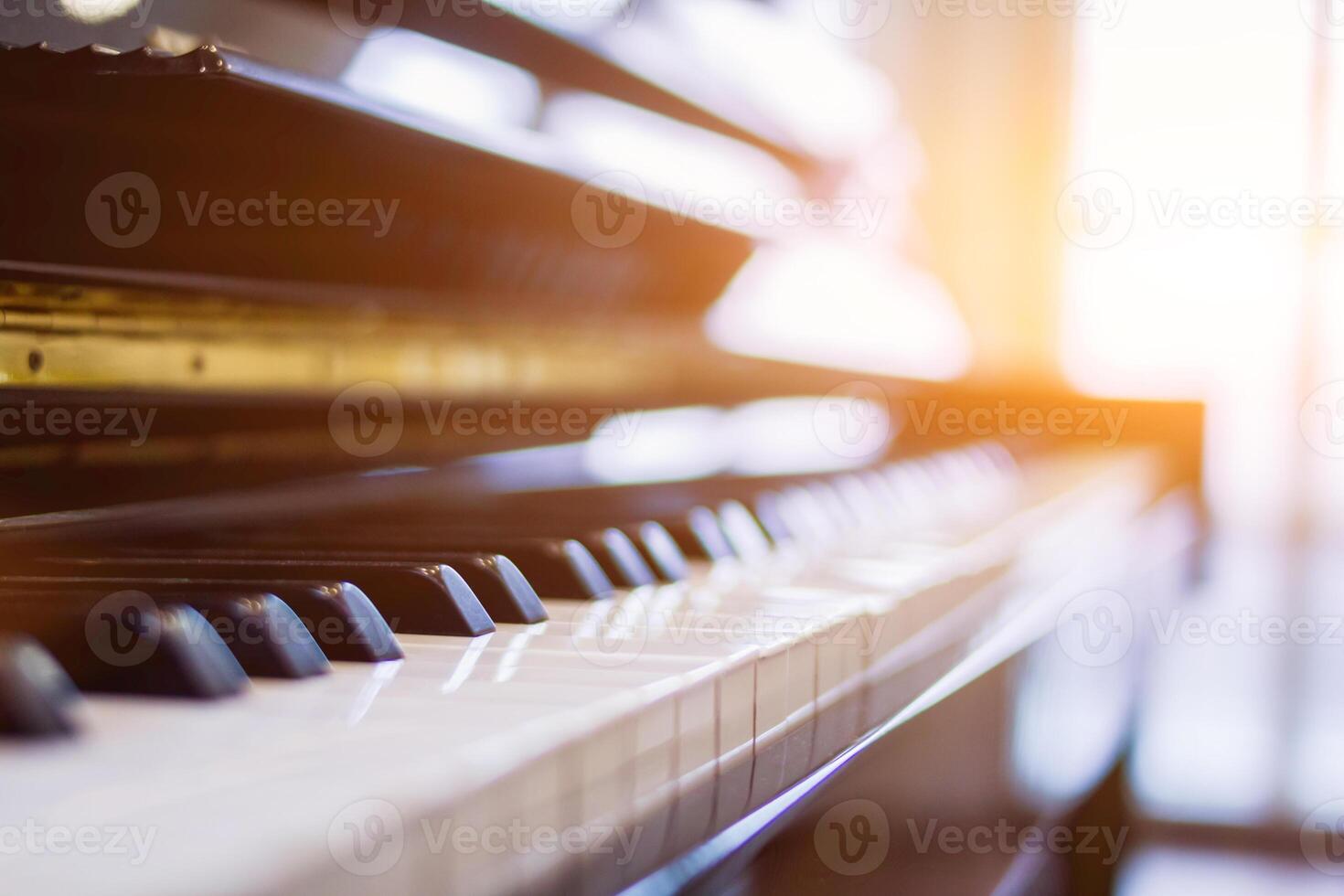 Beautiful piano background are set by the window in the morning waiting for the pianist to come to practice in the morning to reduce the mistake of having to perform the piano performance at a concert photo