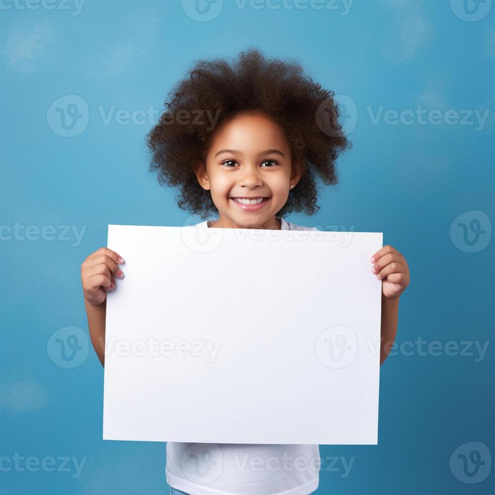 AI generated smiling little girl holding blank white sheet of paper on blue background photo