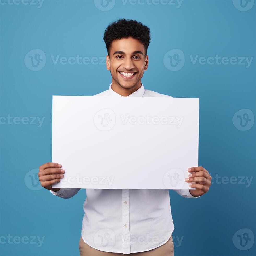 AI generated smiling young businessman holding blank sheet of paper, over blue background photo