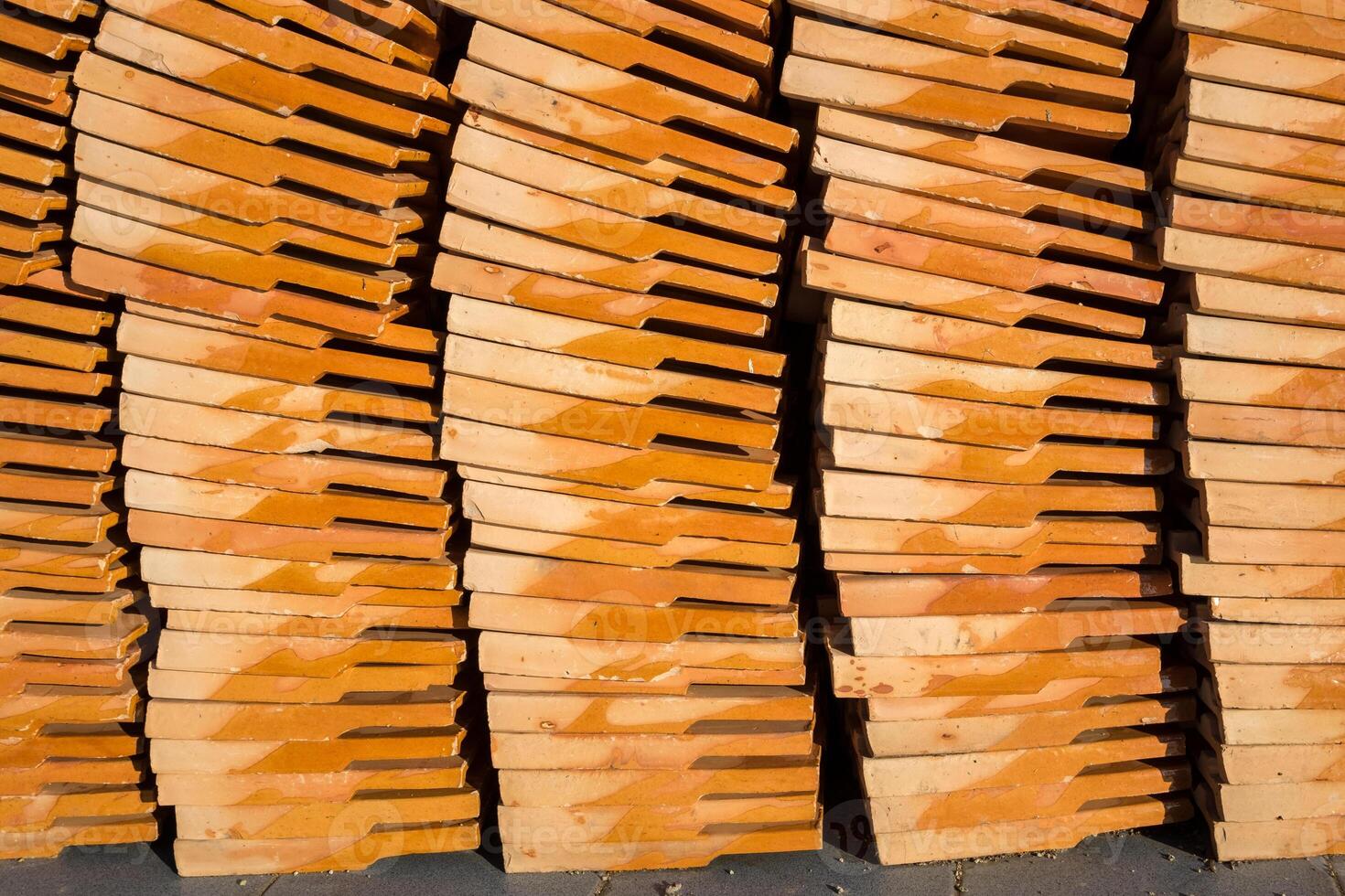 Clay tiles roof orange pile photo