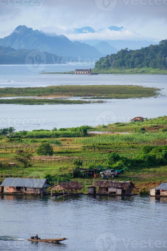 Scenic natural temple in dam with lifestyle thai mon at sangkhlaburi photo