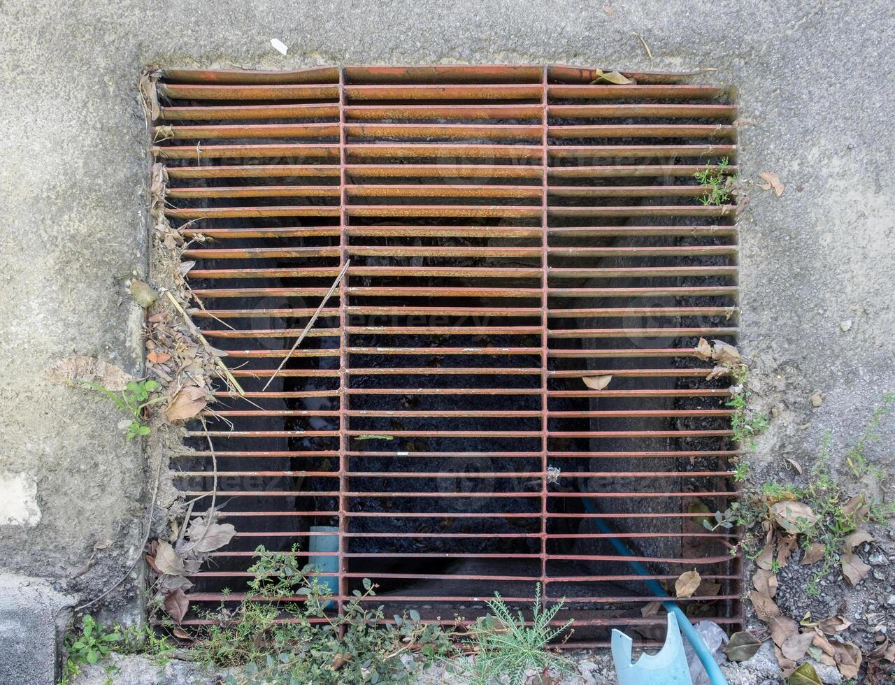 Steel grid rust cover in drain photo