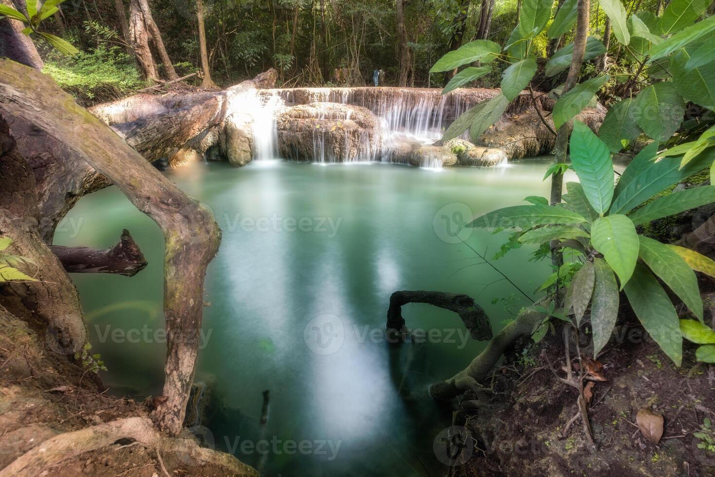 Erawan waterfall in tropical rainforest photo