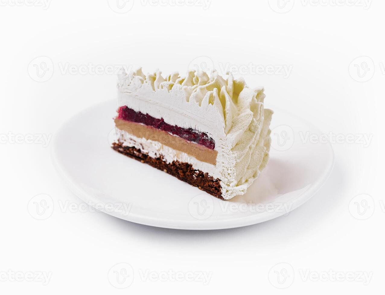 Layered Mousse Cake on plate isolated photo