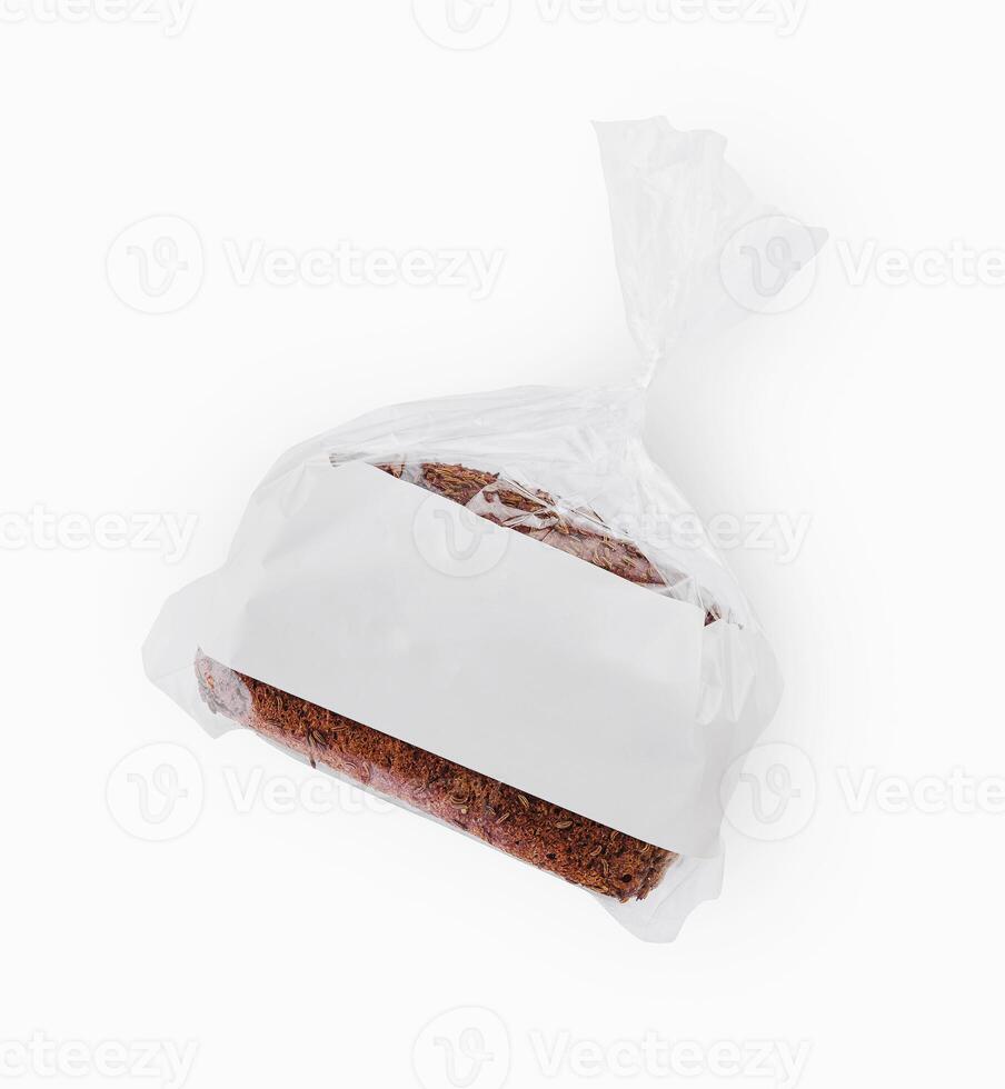 A loaf of bread in a transparent plastic bag photo