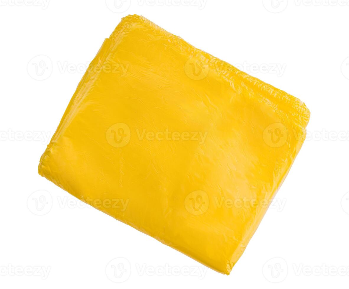 Yellow plastic bag isolated on white background photo