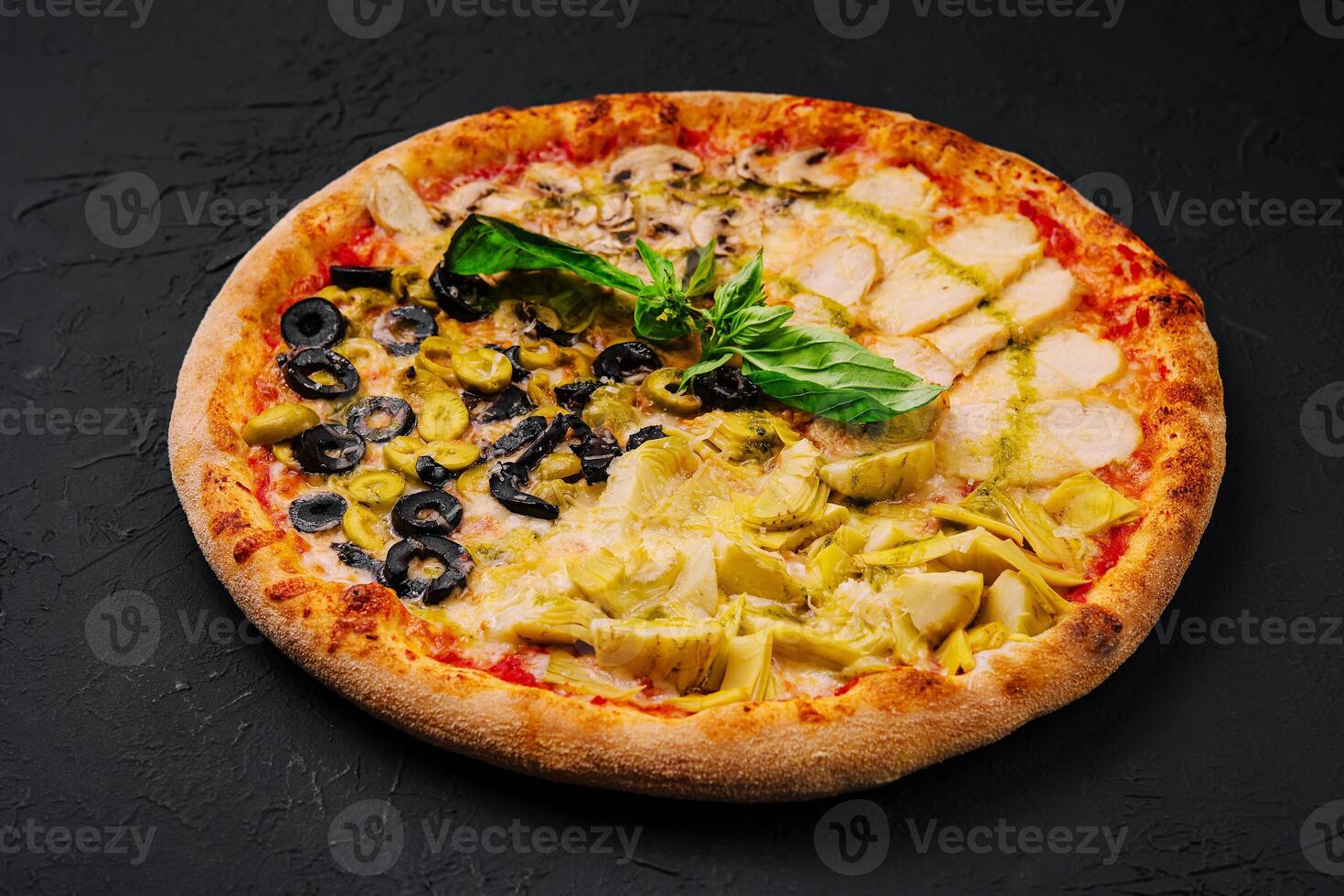 Four varieties of pizza top view photo
