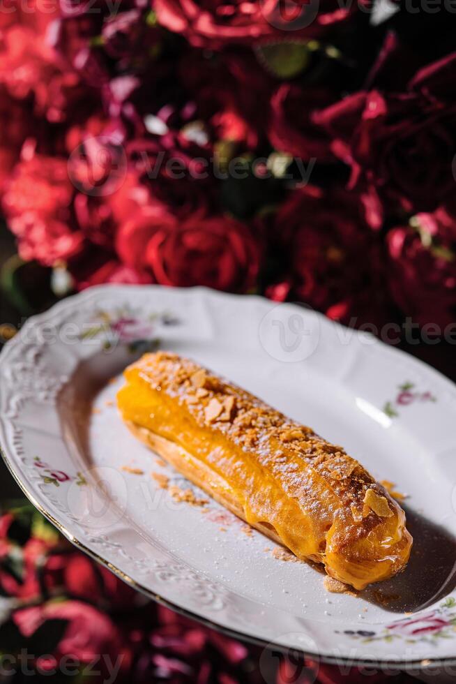 French Artisan Eclair on plate top view photo