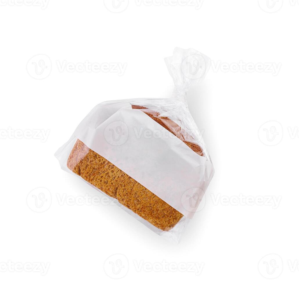 Loaf of wheat bread in plastic bag isolated photo