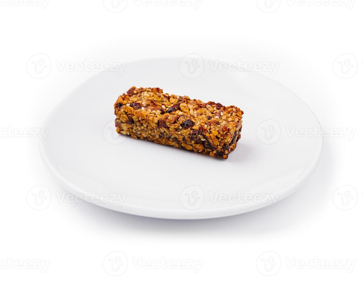 granola bar on white plate isolated on white background photo