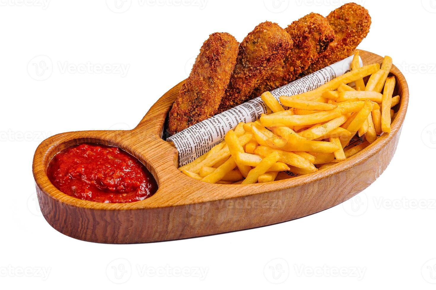 breaded nuggets with a bbq dip and French fries photo