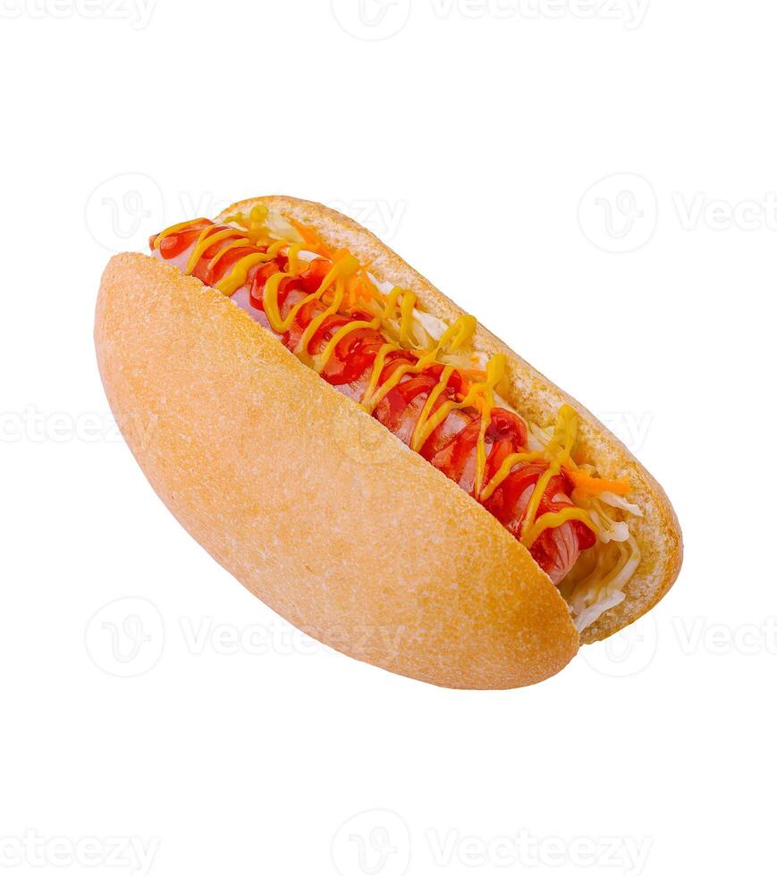 Delicious hot dog with mustard and ketchup on white background photo