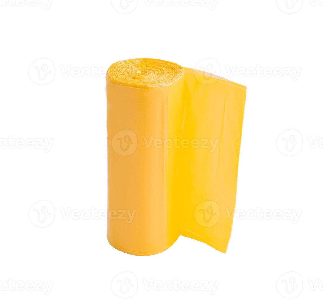 Yellow roll of garbage bags isolated on white photo