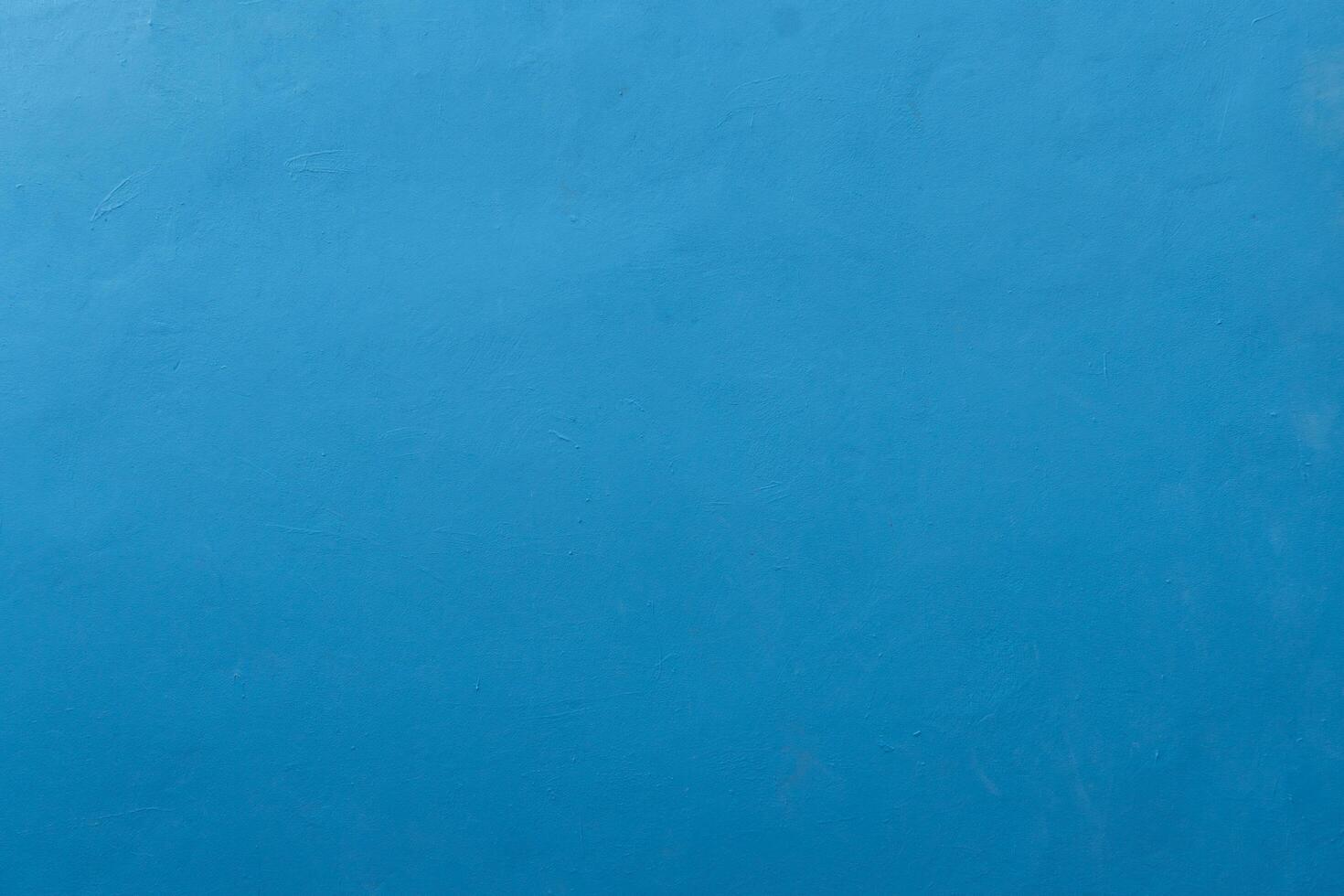 Abstact of cement wall with color paint light blue. for construction background and textured. photo