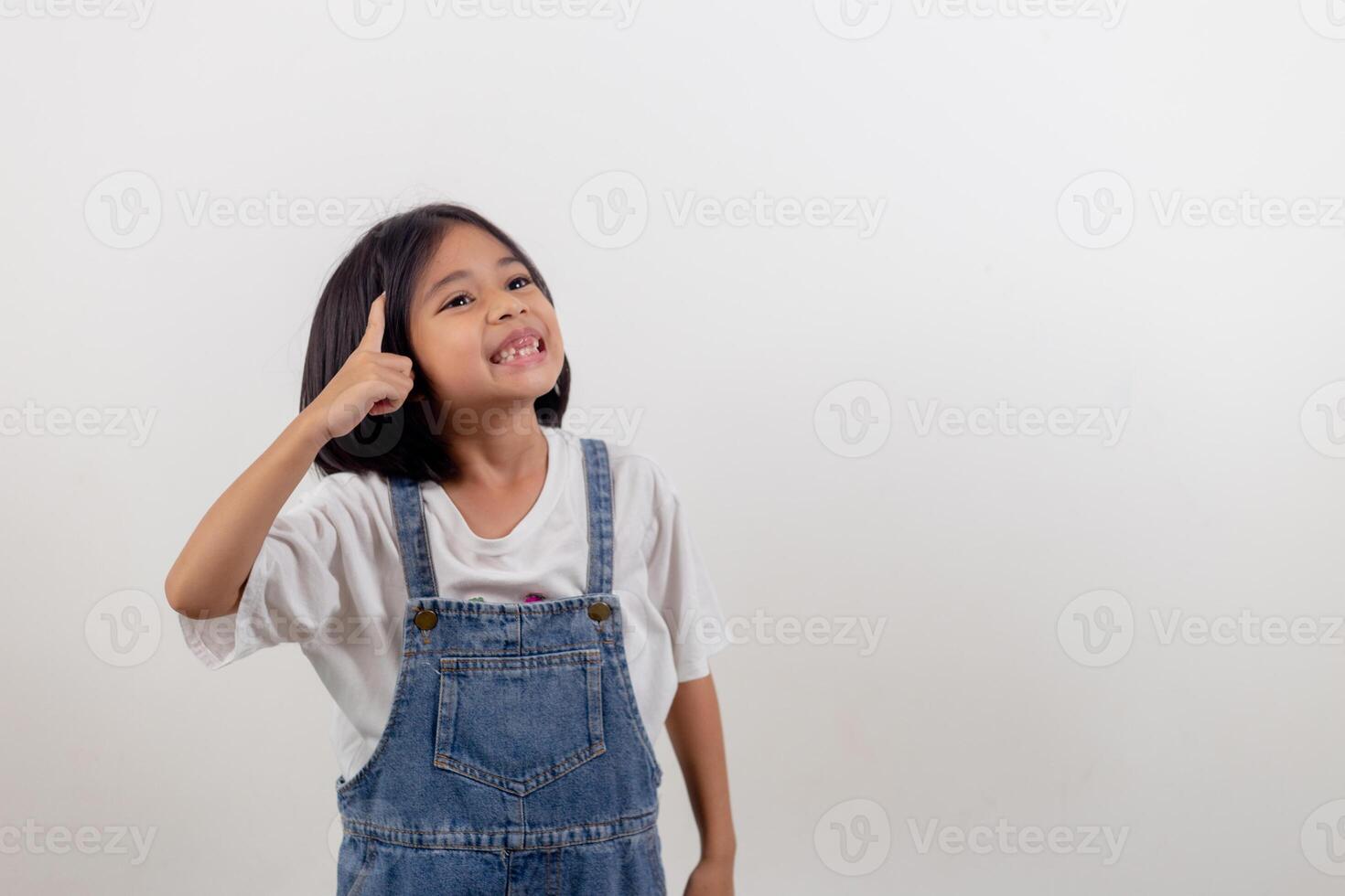 Portrait of happy joyful beautiful Asian girl on a white background. photo