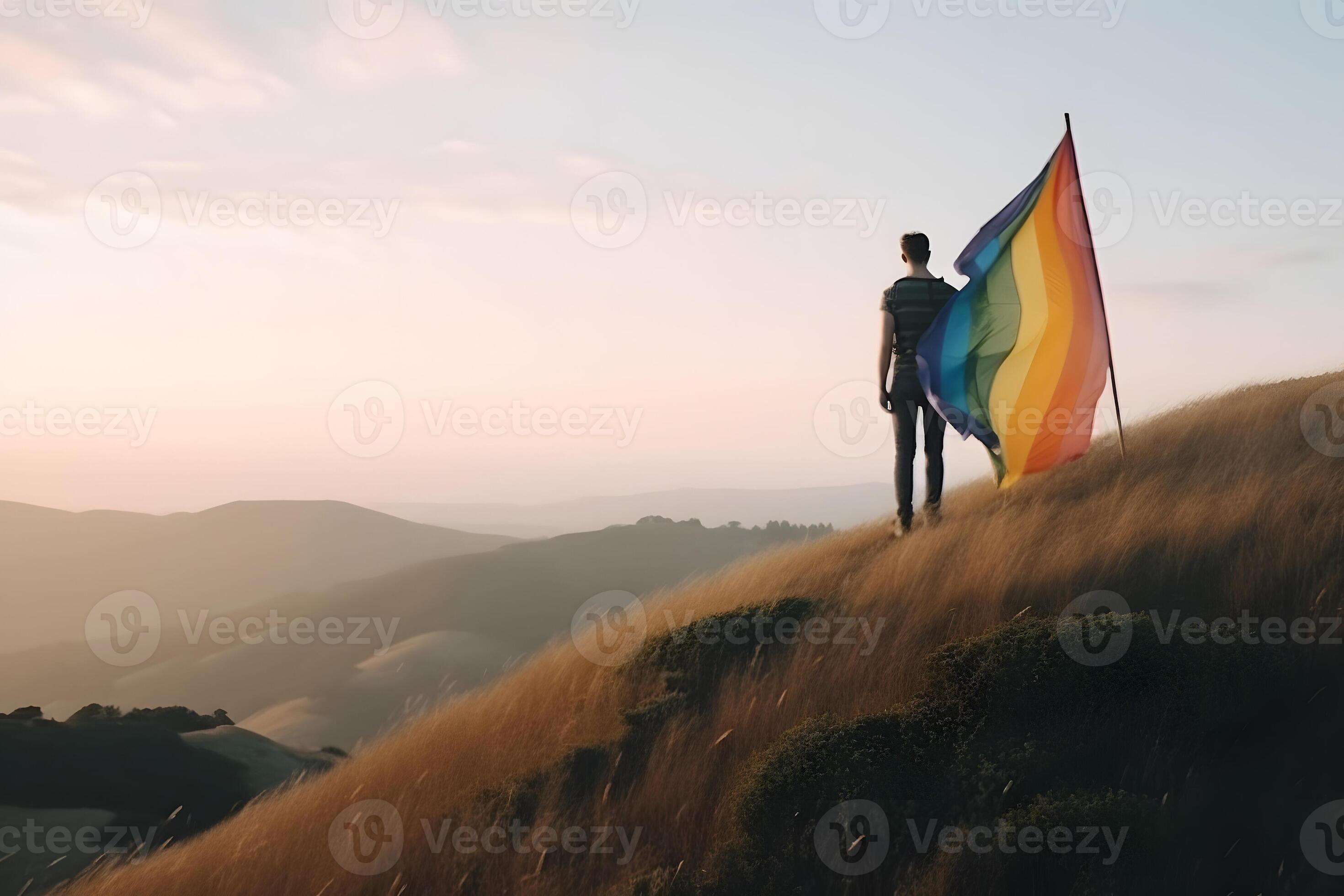 AI generated person standing on top of the hill and holding the LGBT ...
