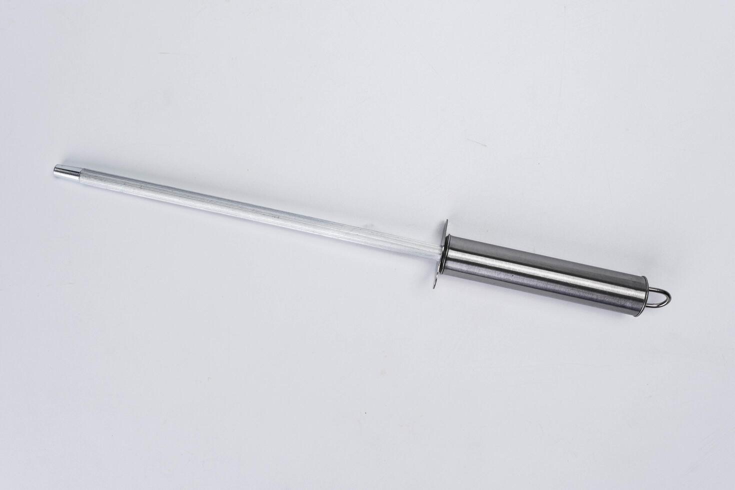 Whetstone sharpener or grindstone isolated on white background. close-up knife grinder photo