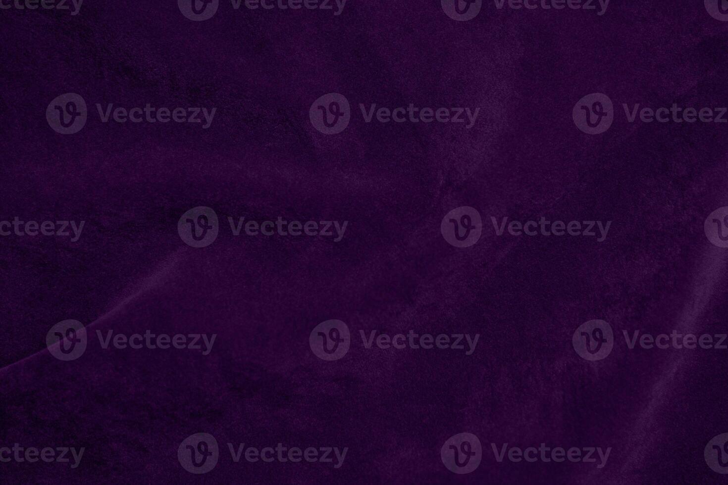 Dark purple velvet fabric texture used as background. violet color purple fabric background of soft and smooth textile material. crushed velvet .luxury dark tone for silk. photo