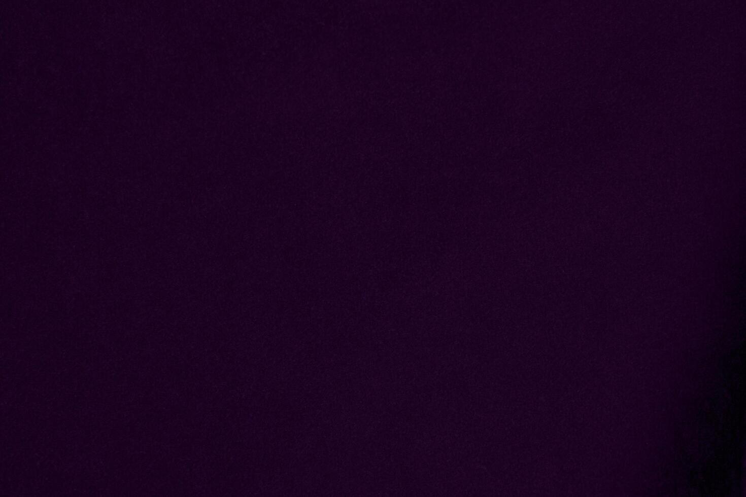 Dark purple velvet fabric texture used as background. violet color purple fabric background of soft and smooth textile material. crushed velvet .luxury dark tone for silk. photo