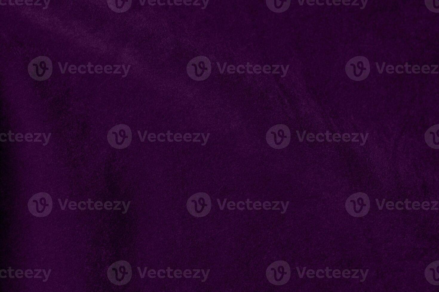 Dark purple velvet fabric texture used as background. violet color purple fabric background of soft and smooth textile material. crushed velvet .luxury dark tone for silk. photo