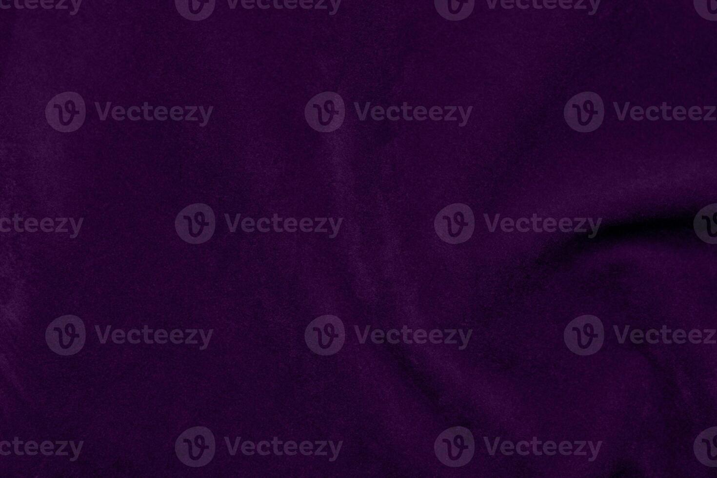 Dark purple velvet fabric texture used as background. violet color purple fabric background of soft and smooth textile material. crushed velvet .luxury dark tone for silk. photo