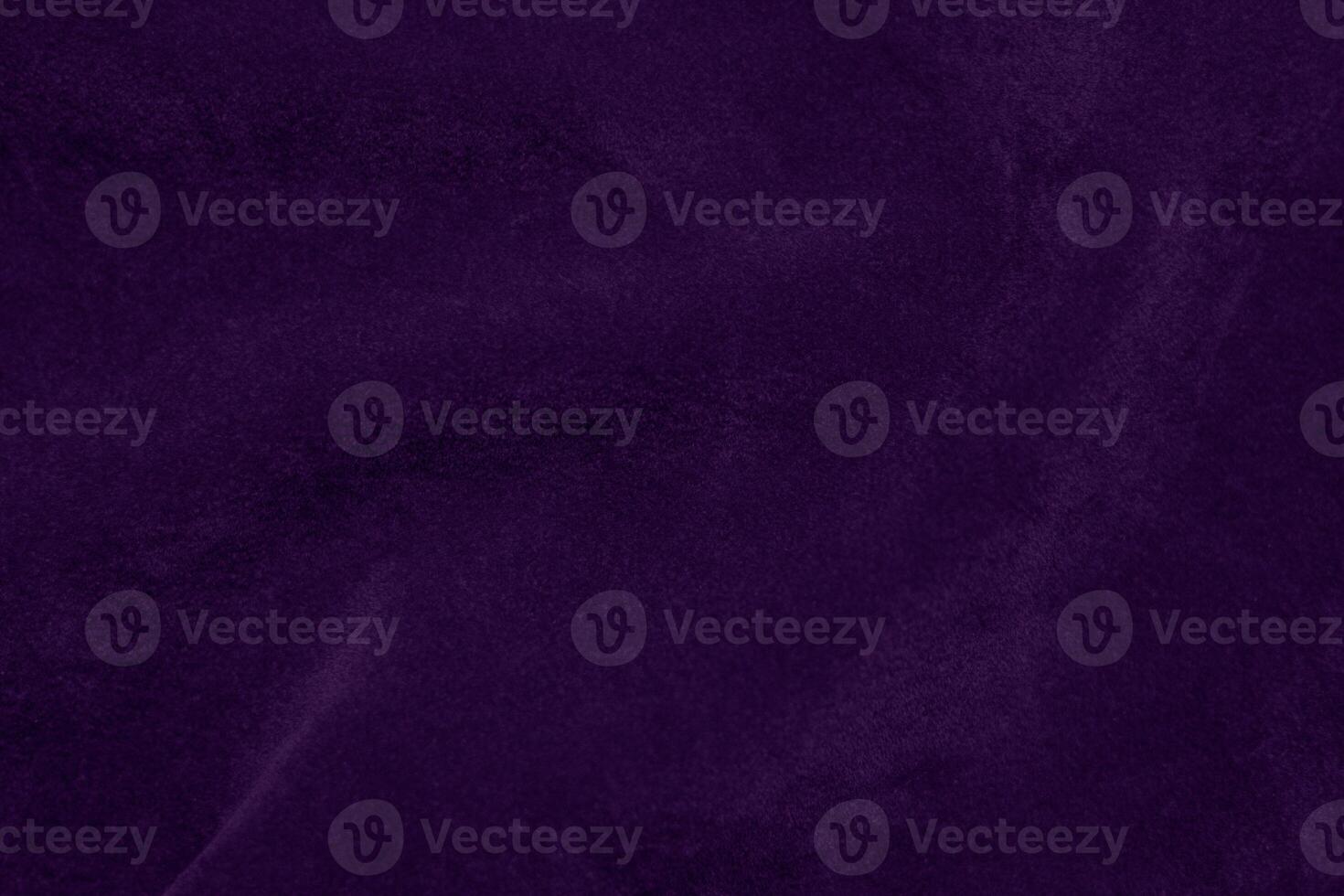 Dark purple velvet fabric texture used as background. violet color purple fabric background of soft and smooth textile material. crushed velvet .luxury dark tone for silk. photo