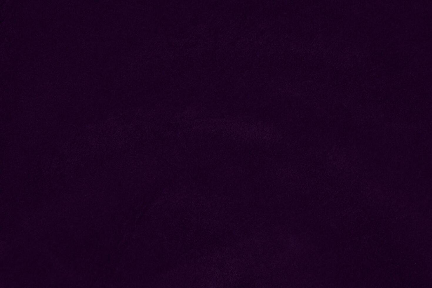 Dark purple velvet fabric texture used as background. violet color purple fabric background of soft and smooth textile material. crushed velvet .luxury dark tone for silk. photo