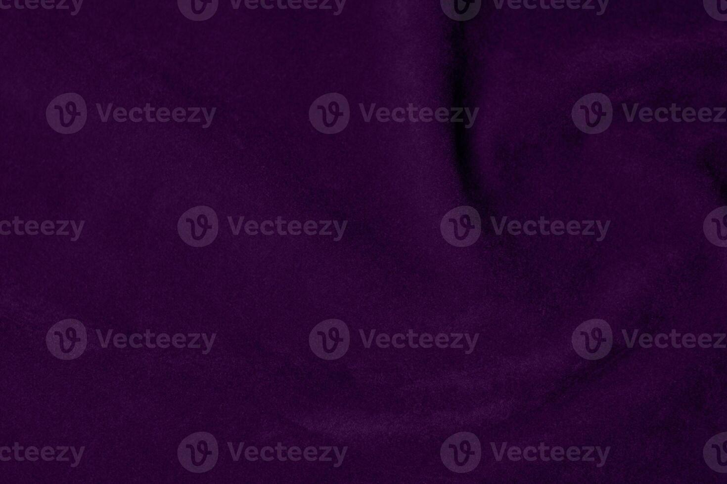 Dark purple velvet fabric texture used as background. violet color purple fabric background of soft and smooth textile material. crushed velvet .luxury dark tone for silk. photo