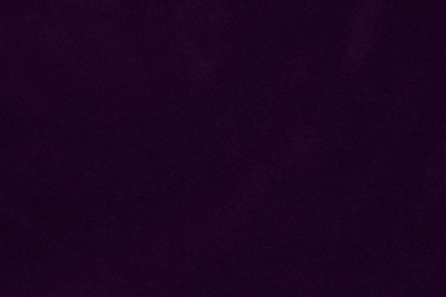 Dark purple velvet fabric texture used as background. violet color purple fabric background of soft and smooth textile material. crushed velvet .luxury dark tone for silk. photo