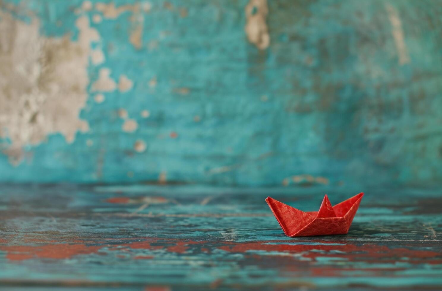 ai generado un pequeño papel barco con rojo vela en de madera cubierta foto