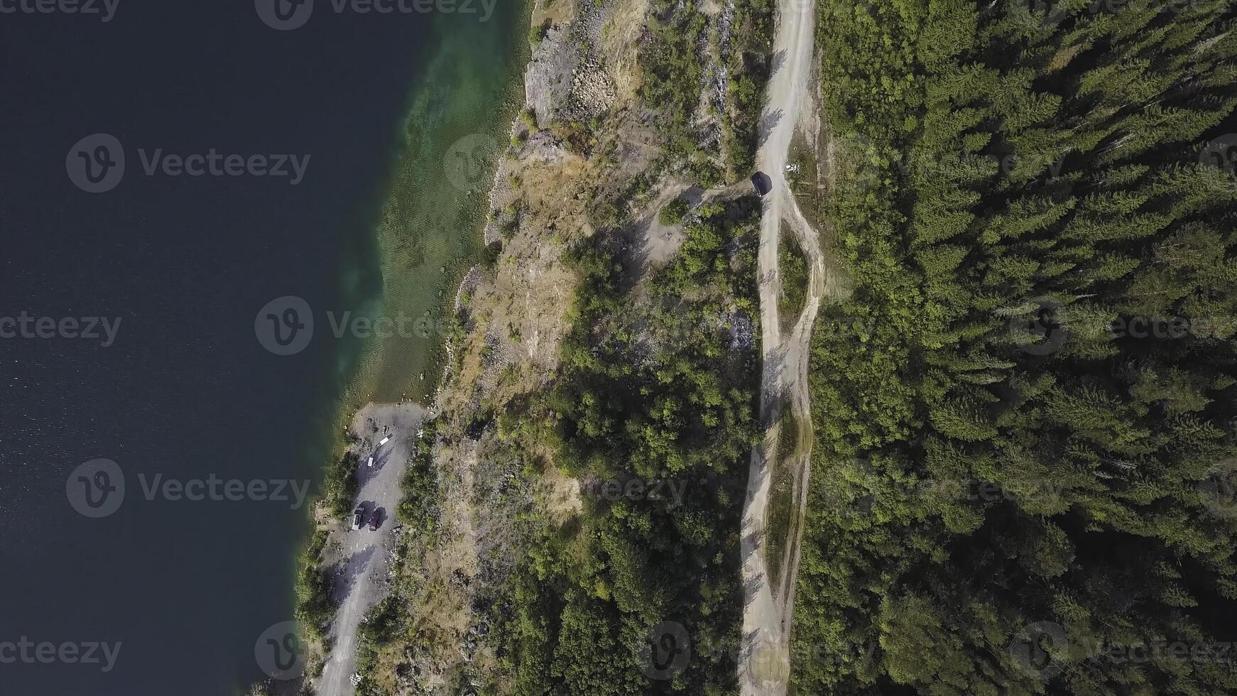 Morning quiet river with forest. Shot. Aerial View. Flying over the beautiful mountain River and forest. Aerial camera shot. Aerial panorama of the green forest and near mountain river. Landscape photo