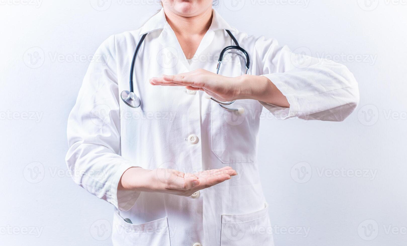 Female doctor hands presenting something isolated. Hands of female doctor holding something isolated photo