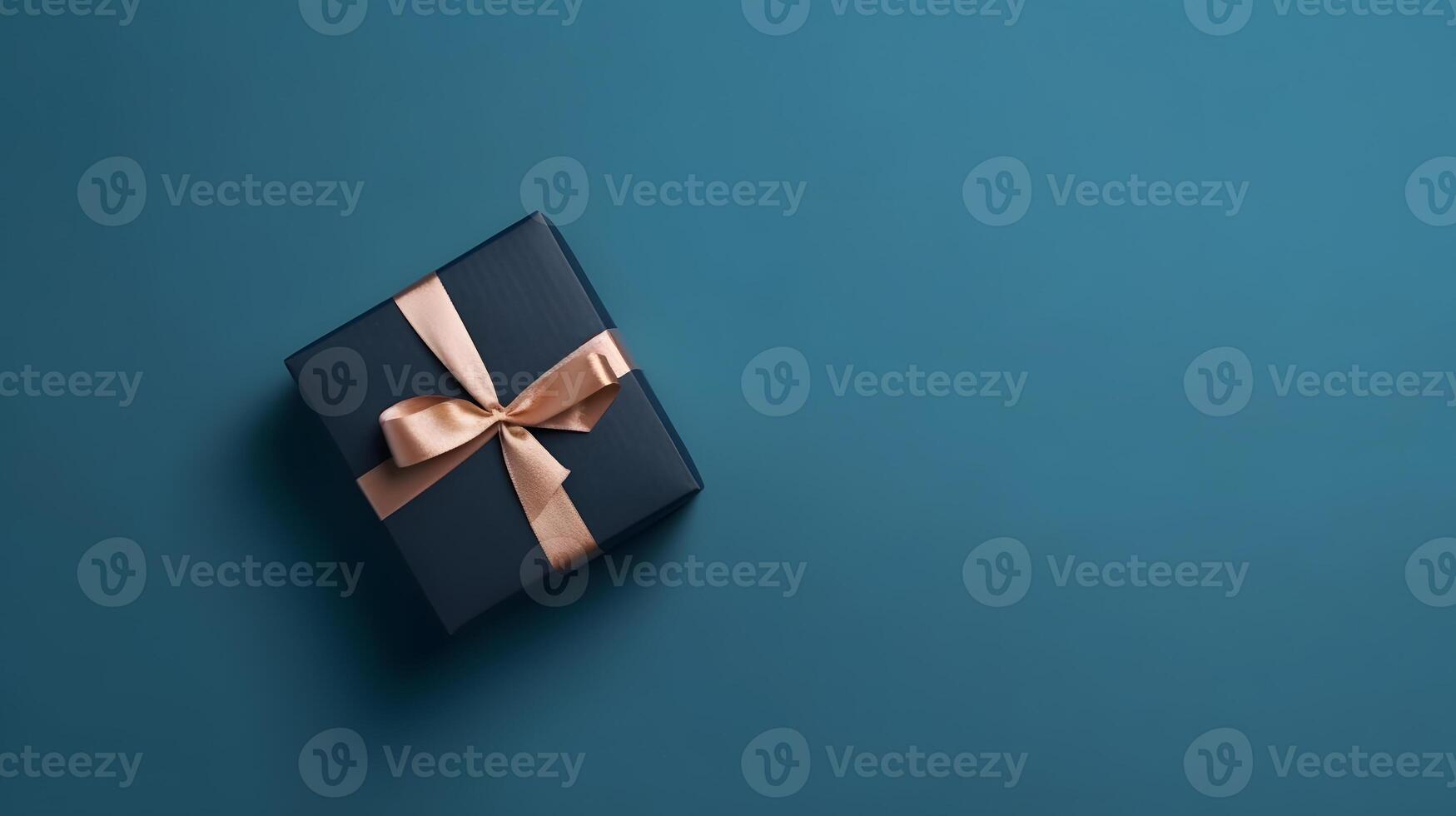 AI generated One dark blue gift box in craft wrapping paper and peachy satin ribbon with bow on light blue clean flat surface background, neural network generated image photo