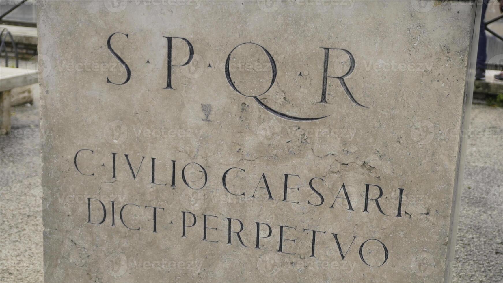Roman writing and bas-reliefs imperial era archeology italy. Stock. SPQR inscription on the wall photo